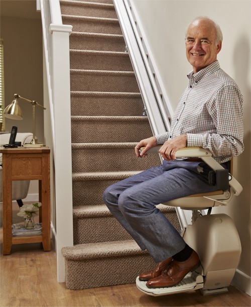 man-at-bottom-of-straight-stairlift